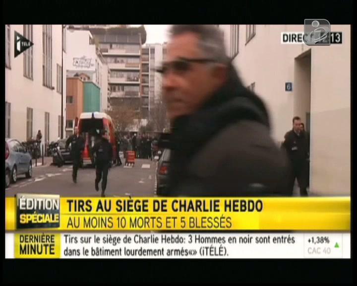  Ataque a jornal satírico francês faz 12 mortos %7B0%7D&w=171