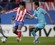 «Kun» Aguero e Rolando, durante o At. Madrid-F.C. Porto