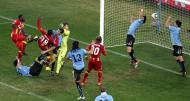 Julho: a famosa mão de Suarez no Uruguai-Gana