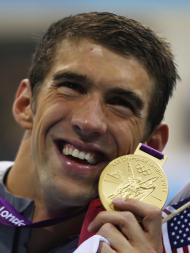 O dia histórico de Michael Phelps ( EPA/DENNIS M. SABANGAN)