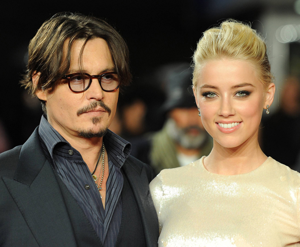 Johnny Depp e Amber Heard - Antestreia «The Rum Diary» em Londres Foto: Reuters