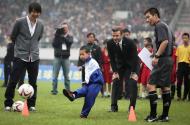 David Beckham ensina a jogar futebol na China Foto: Reuters