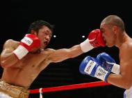 Akira Yaegashi vs Oscar Blanquet (Reuters/Yuya Shino)