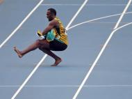 Dança de Bolt, após a vitória da Jamaica em 4x100 (Reuters/Phil Noble)