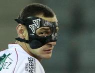 O húngaro Vilmos Vanczak, é outro dos futebolistas que colocou as iniciais na sua máscara (Reuters)