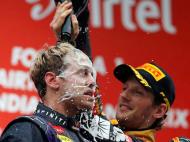 Banho de champanhe para Vettel (EPA/VALDRIN XHEMAJ)