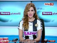 Jornalista egípcia com a camisola do Nacional