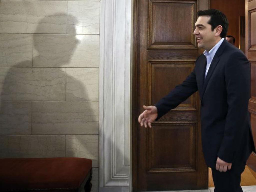 Jeroen Dijsselbloem e Alexis Tsipras [Foto: Reuters]