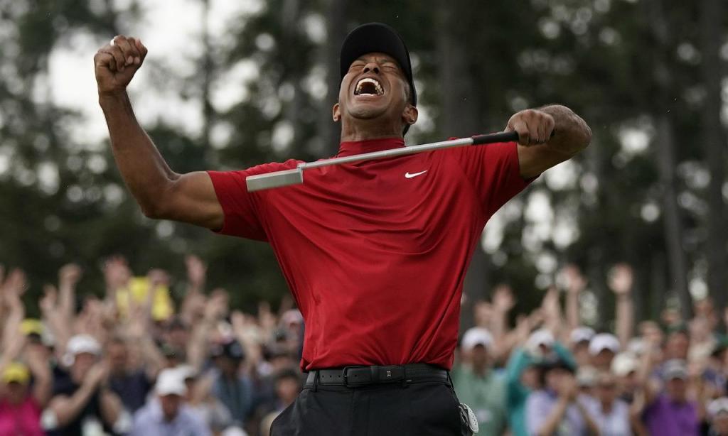 Tiger Woods voltou a vencer no Grand Slam de golfe após 11 anos e conquistou o Masters 14 anos depois (AP Photo/David J. Phillip)