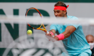Rafael Nadal na terceira ronda de Roland Garros após vitória sobre Mackenzie McDonald (Christophe Ena/AP)