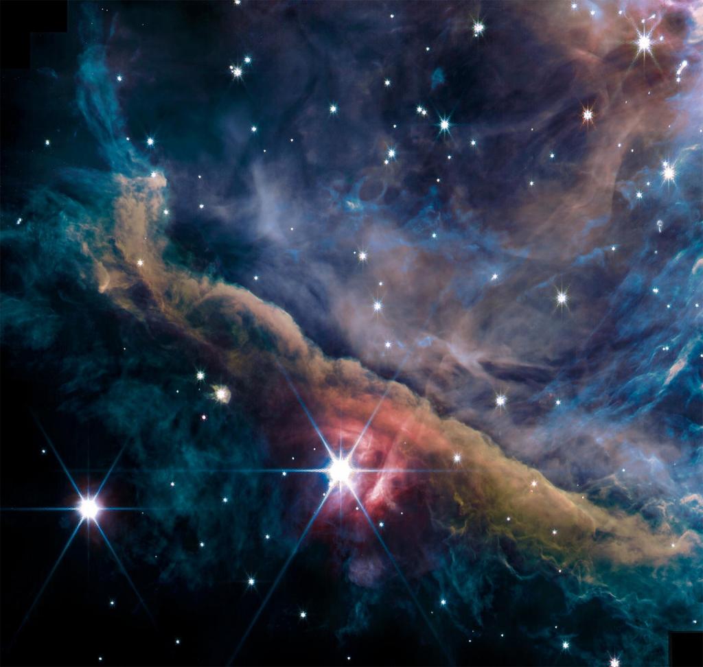 O interior da Nebulosa de Órion visto pelo instrumento NIRCam do Telescópio Espacial James Webb.