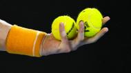 Bolas de ténis no Open da Austrália (LUKAS COCH/EPA)