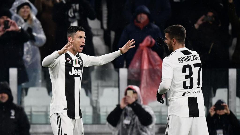 Ronaldo e Spinazzola (MARCO BERTORELLO/AFP via Getty Images)