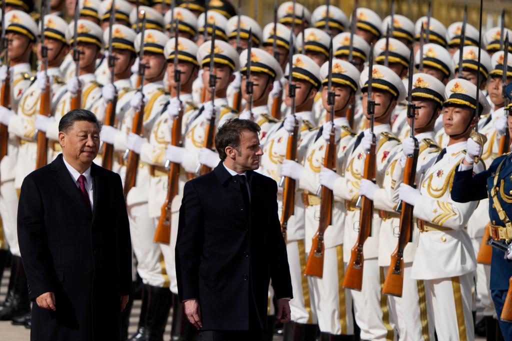 Xi Jinping e Emmanuel Macron (AP Photo/Ng Han Guan, Pool)