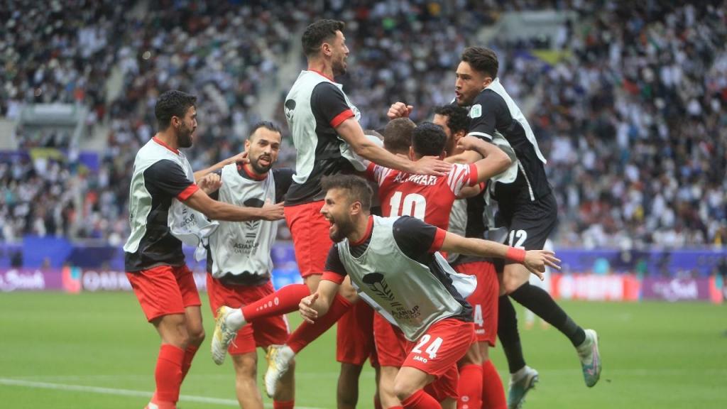 Taça Asiática: Jordânia festeja golo ante o Iraque (AP/Hussein Sayed)